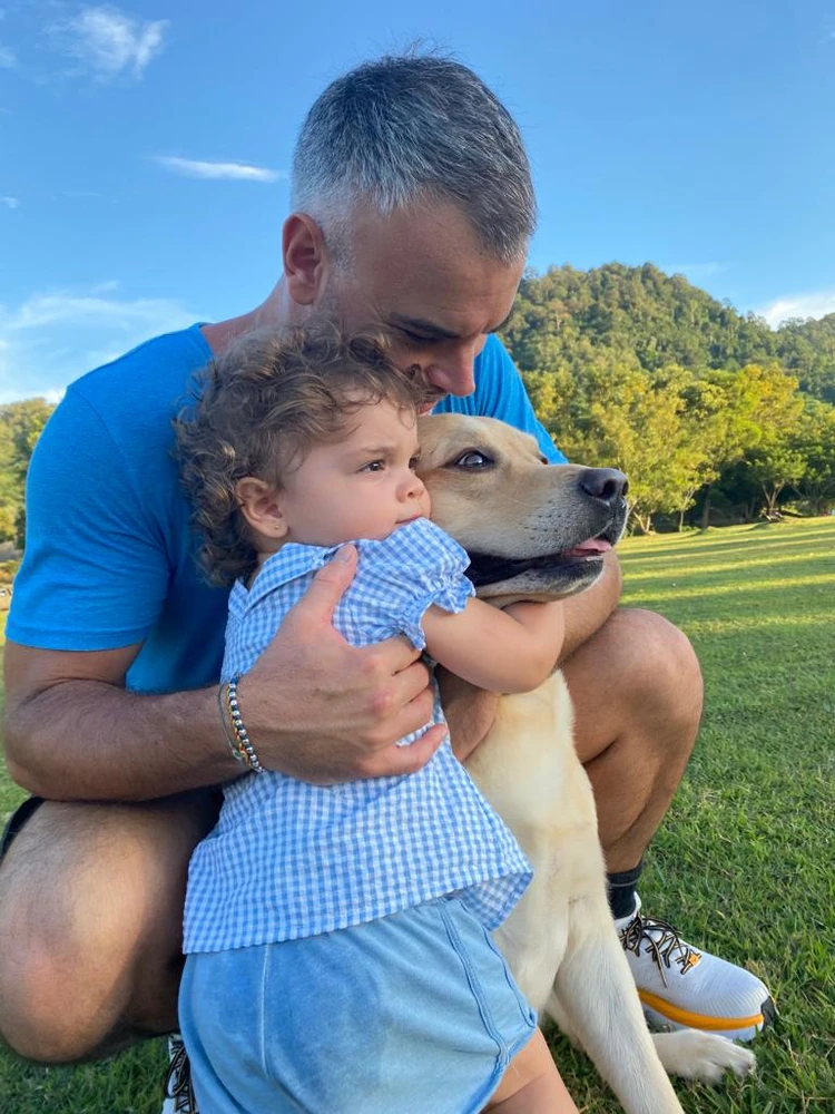 Luca Dotti with his daughter and dog
